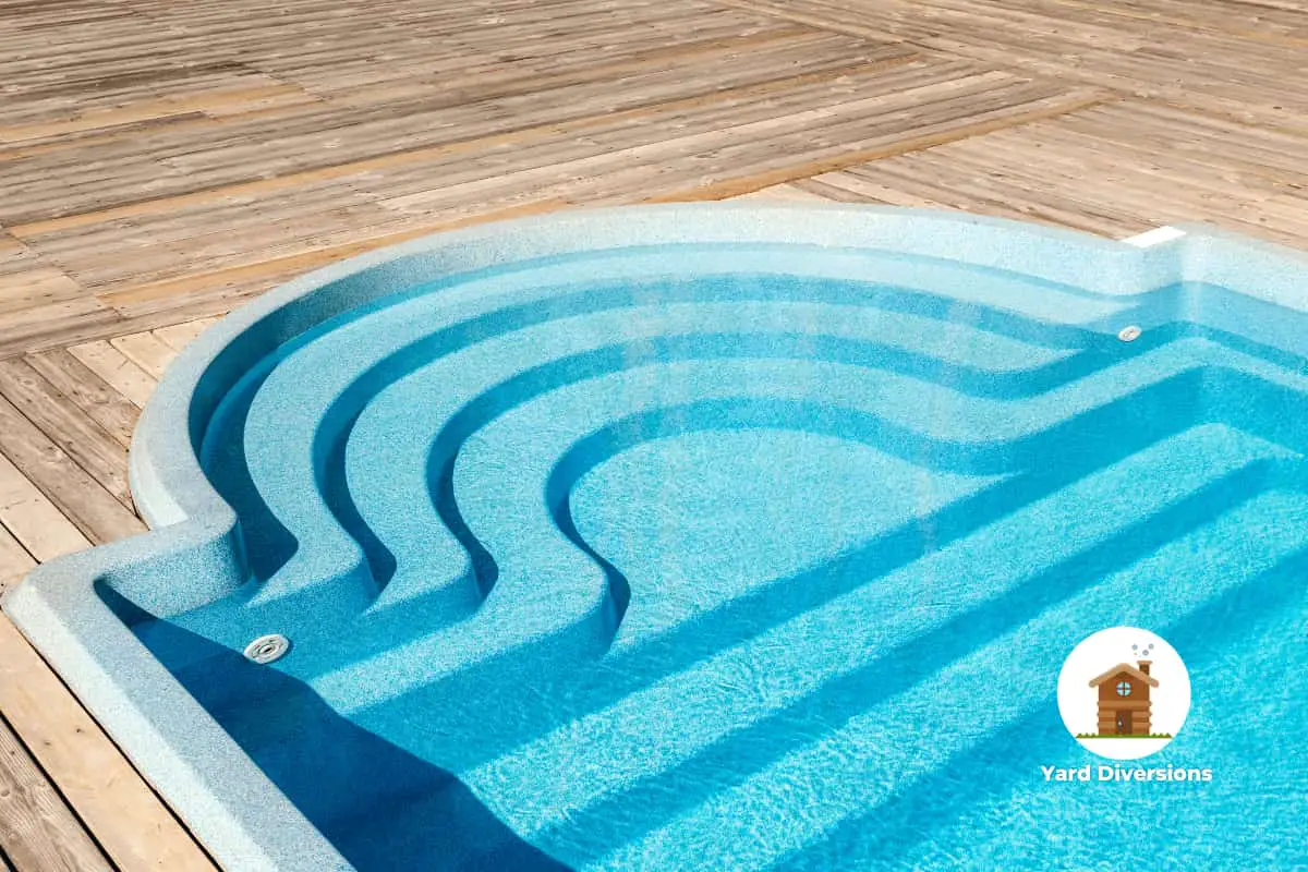 New modern fiberglass plastic swimming pool and wooden pool decking