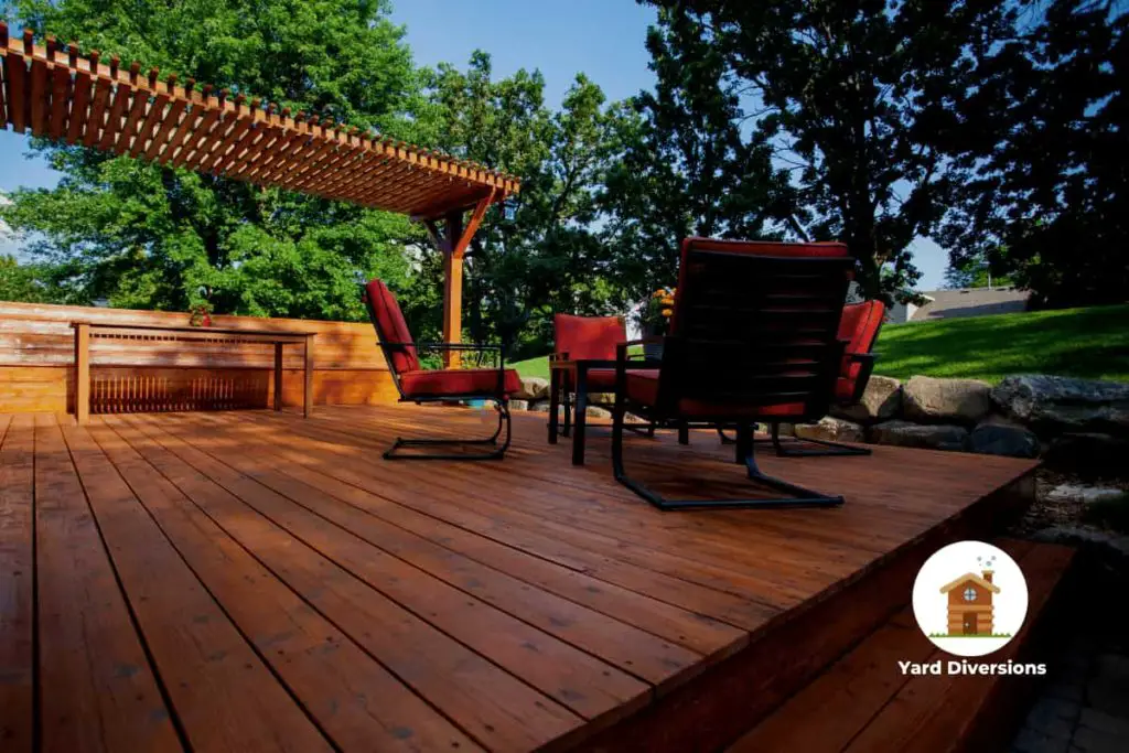 Pergola and backyard deck with patio furniture perfect for relaxing