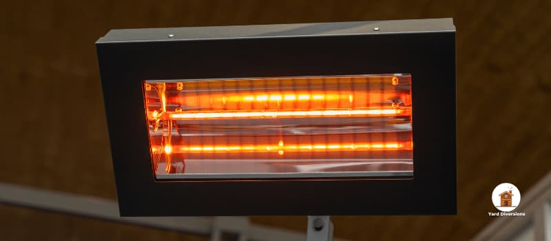 Close up of an infrared heater attached to a ceiling