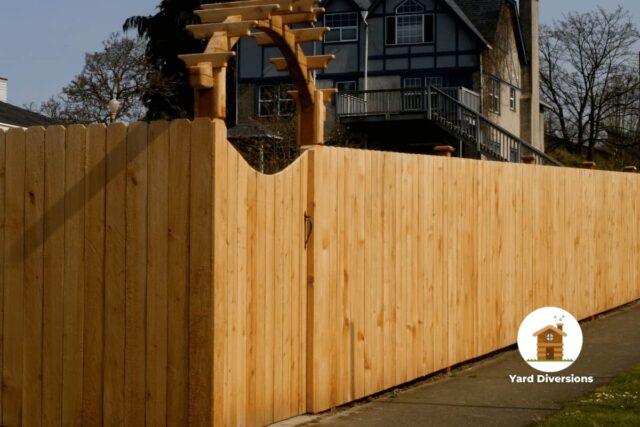 brand new privacy fence with a gate to keep yard from prying eyes