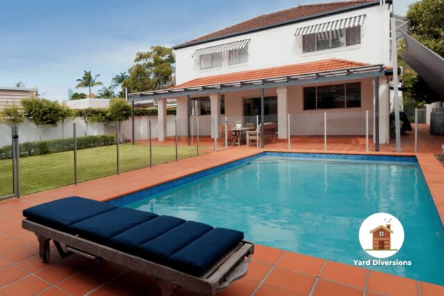 Nice backyard pool enclosed within a fence for safety