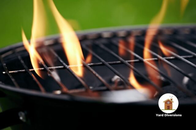 Fire coming up through the charcoal grill when lit