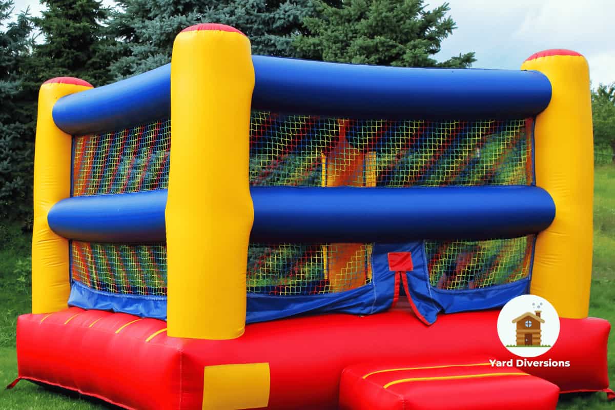Inflatable bounce house set up in the yard to jump and burn out kids energy levels