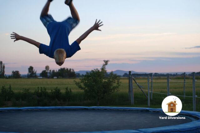 Man doing a flip on his trampoline