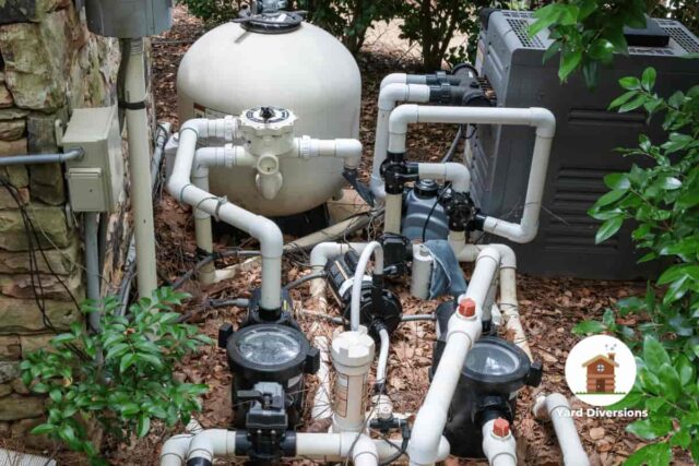 Vast array of the pool equipment needed to keep it clean and regular with numerous pumps and piping along with the breakers and controls