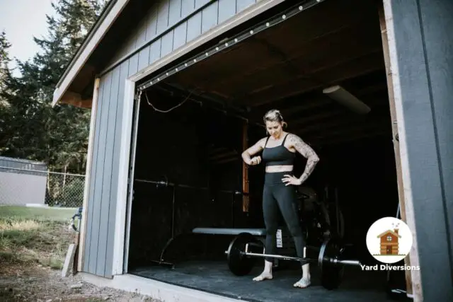 Woman working out in her personal home garage gym