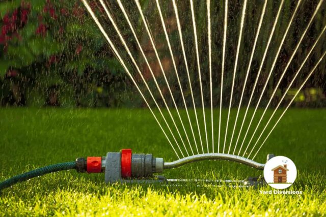Lawn sprinkler running to enure grass is adequately watered
