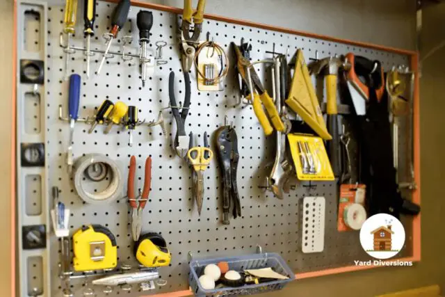 Tools mounted on the wall inside the garage for easy access