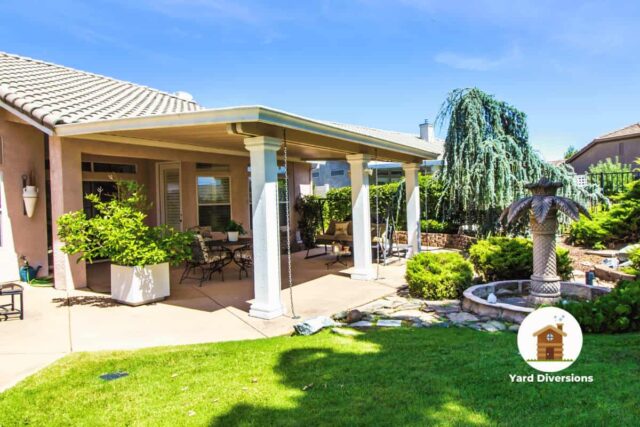 Patio witha nice cover allowing enjoyment of seating in shade and out of the elements