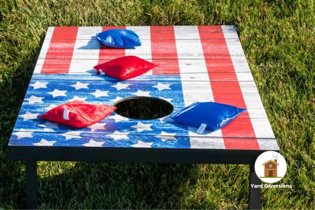 Close up on cornhole bags on a Patriotic cornhole board using the stars and stripes for visual appeal