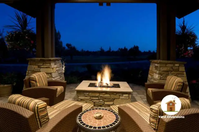 Propane fire pit locacted under a gazeboo for rain and element protection